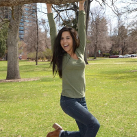 Brunette teen Bella Quinn teases and poses in the tree