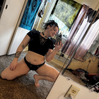 Solo amateur Dakota Marr smoking a cigar and posing