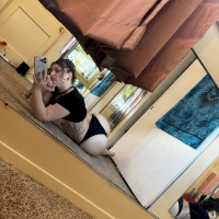 Solo amateur Dakota Marr smoking a cigar and posing