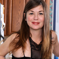Ophelia Rosenburg opens up her very hairy pussy
