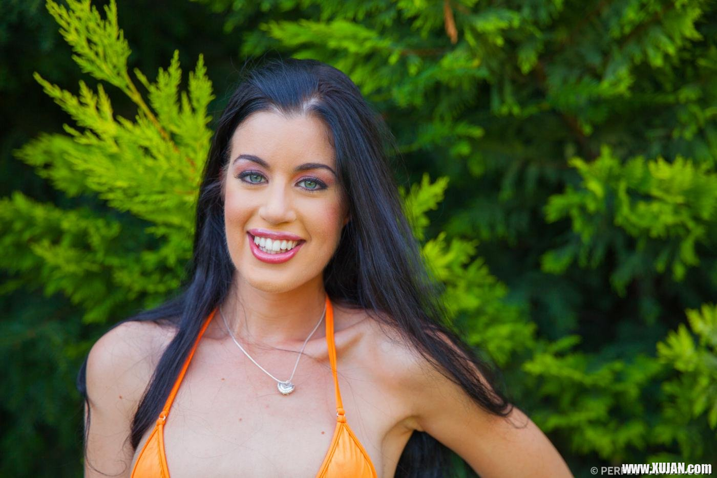 Gorgeous April Blue posing in an orange bikini outdoors - Photo #2573349
