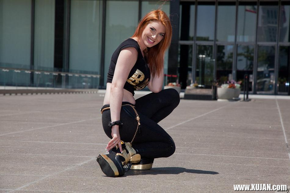 Redhead babe Lilith Lust flashes her crotch tatoo outside - Photo #2584107