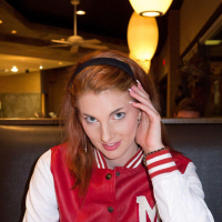 Beautiful redhead Lilith Lust shows you whats up her pretty skirt