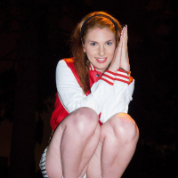 Beautiful redhead Lilith Lust shows you whats up her pretty skirt