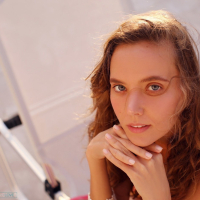 Slim hottie Katya Clover sunbathing completely naked on the beach