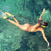 Amazing girl Katya Clover reveals her nice body by the ocean