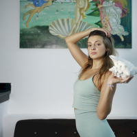 Sweet Melena Maria Rya wearing a short dress while eating
