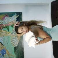 Sweet Melena Maria Rya wearing a short dress while eating