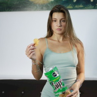 Sweet Melena Maria Rya wearing a short dress while eating