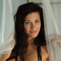 Brunette babe Lauren Crist modeling sexy legs in lingerie for glam pictures