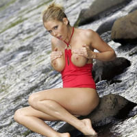 Cute Jamie Brooks with big boobs poses by the river