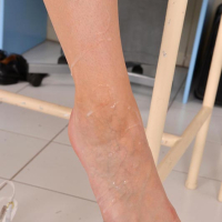 Leggy stocking clad blonde Sweet Cat taking cumshot on barefeet from doctor