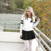 Blonde pornstar Karla Kush posing topless outdoors in schoolgirl uniform