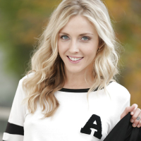 Blonde pornstar Karla Kush posing topless outdoors in schoolgirl uniform