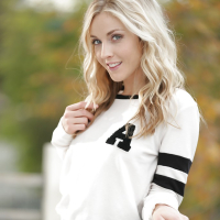 Blonde pornstar Karla Kush posing topless outdoors in schoolgirl uniform