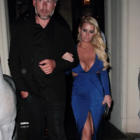 Jessica Simpson busty and leggy in blue plunging dress