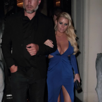 Jessica Simpson busty and leggy in blue plunging dress