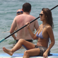 Jessica Alba wearing tiny blue string bikini in Hawaii