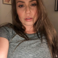 Lovely busty milf Ava Nicks is spreading legs and showing her bald pussy