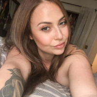Lovely busty milf Ava Nicks is spreading legs and showing her bald pussy