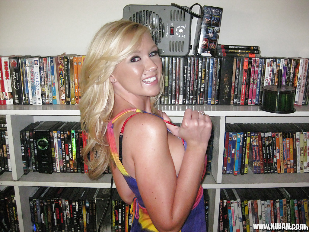 Milf Dylan Riley is smiling on camera and playing with her boobies - Photo #2761881