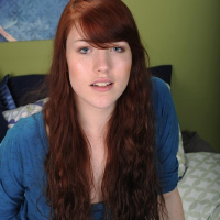 Redhead coed Gwen Stark spreading her wet pussy
