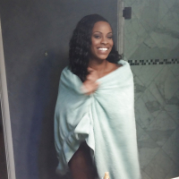 Ebony Tori Taylor is taking bath and touching her wet boobies