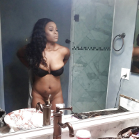 Ebony Tori Taylor is taking bath and touching her wet boobies