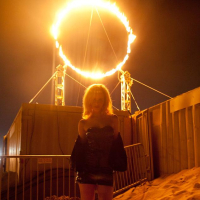 Blonde coed Catie Parker has some fun on a beach at night