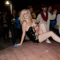 Blonde coed Catie Parker has some fun on a beach at night