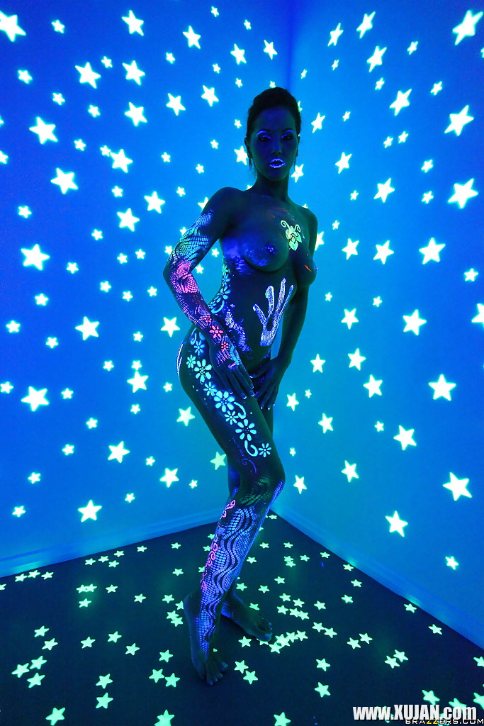Angel Dark has her sexy booty and tits prettified with glowing bodyart - Photo #2843959
