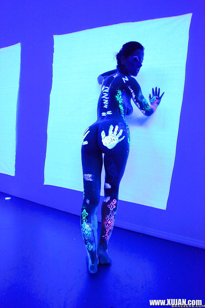 Angel Dark has her sexy booty and tits prettified with glowing bodyart - Photo #2843961