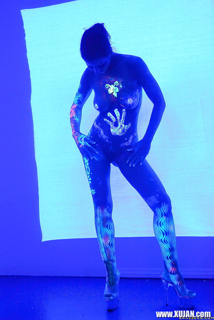 Angel Dark has her sexy booty and tits prettified with glowing bodyart - Photo #2843962