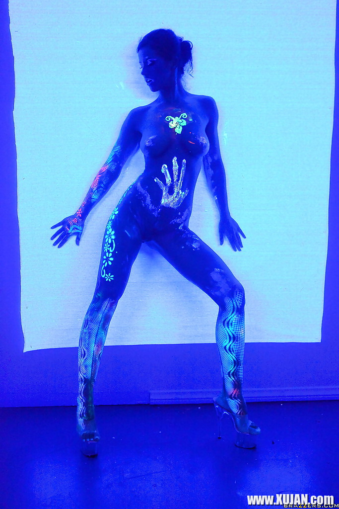 Angel Dark has her sexy booty and tits prettified with glowing bodyart - Photo #2843965