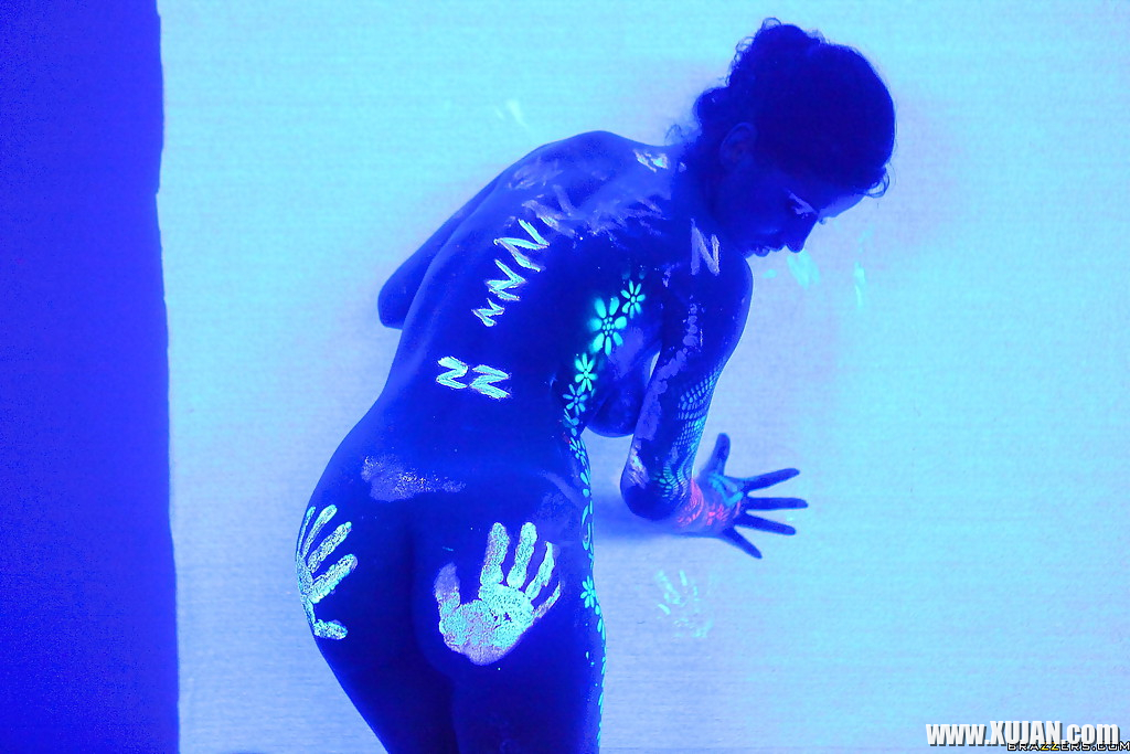Angel Dark has her sexy booty and tits prettified with glowing bodyart - Photo #2843966