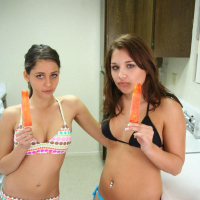 Lili Jensen and Cali Logan practise their blowjob skills on popsicles