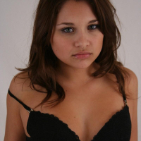 Lili Jensen gets topless in bed waiting for you to join her