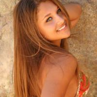 Watch as Lili strips out of her bikini at the beach