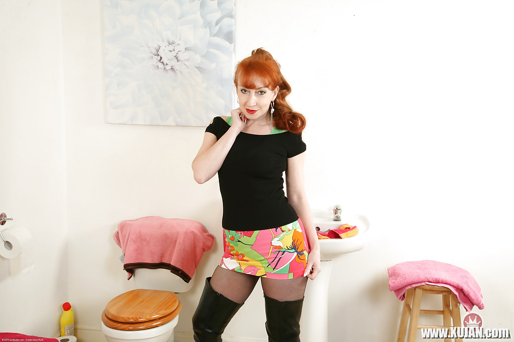 Aged redhead woman by name of Red posing for naughty hose and boot pics - Photo #2867858