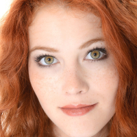 Beauty redhead girl strips out of her tight leopard dress
