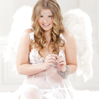 Cute blonde teen Melissa May posing in white lingerie and nylons