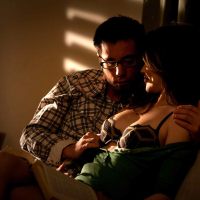 Tiffany Fox making love to her boyfriend in their dark living room