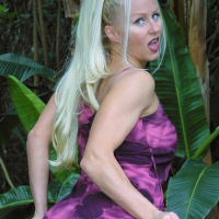 Blonde Trixie Swallows exposing her Butt