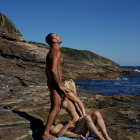 Smoking hot Chloe Delaure fucking two guys in a threesome by the sea