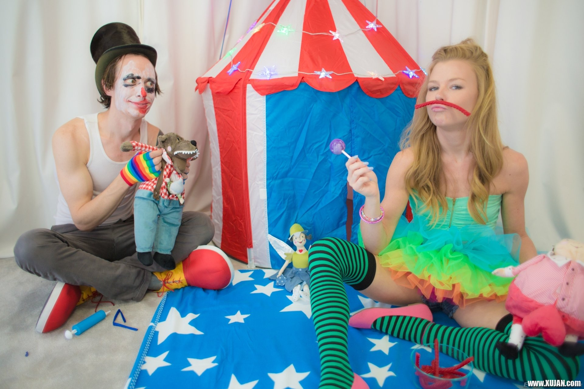 Young blonde Nicole Clitman loves cramming giant lollipops down her throat so creepy clown Owen Gray arrives to satisfy her oral fixation The audacious vixen wears a frilly skirt and striped stockings while slurping clown cock She bends over to take hi - Photo #2911489