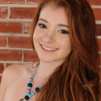 Cute perky redhead teen Ava Sparxxx stripping