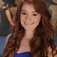 Sexy redhead teen Ava Sparxxx exposes her tight trimmed pussy