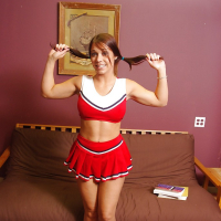 Bosomy cheerleader Beverly Hills stripping and spreading her legs