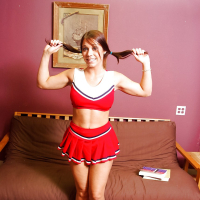 Leggy brunette babe Beverly Hills flashing upskirt panties in cheer outfit