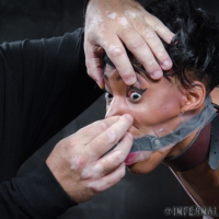 Nikki Darling is bound in chains and made to orgasm by maledom J